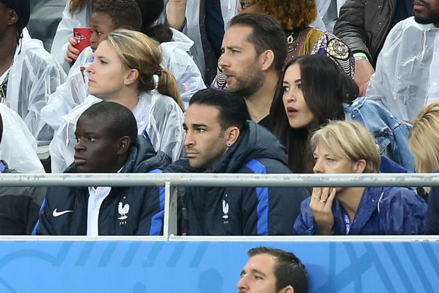 PARIS, FRANCE - JULY 3: N'Golo Kante, Adil Rami and Sidonie Biemont behind attend the UEFA Euro 2016 quarter final match between France and Iceland at Stade de France on July 3, 2016 in Saint-Denis near Paris, France. (Photo by Jean Catuffe/Getty Images)