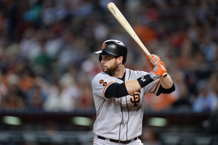 Brandon Belt captain of the ceremonial first pitch at Giants' opener