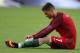 PARIS, FRANCE - JULY 10: Cristiano Ronaldo of Portugal reacts to an injury during the UEFA Euro 2016 Final match between Portugal and France at Stade de France on July 10, 2016 in Paris, France. (Photo by Matthew Ashton - AMA/Getty Images)