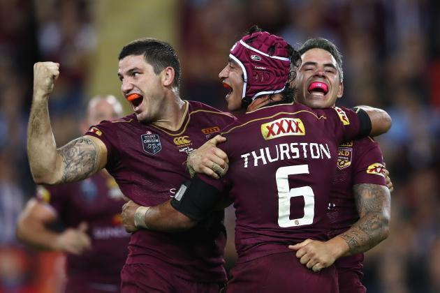 BRISBANE, AUSTRALIA - JUNE 22:  Matt Gillett, Johnathan Thurston and Corey Parker of the Maroons celebrate victory during game two of the State Of Origin series between the Queensland Maroons and the New South Wales Blues at Suncorp Stadium on June 22, 2016 in Brisbane, Australia.  (Photo by Mark Kolbe/Getty Images)