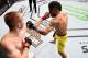 SIOUX FALLS, SD - JULY 13: (R-L) John Lineker punches Michael McDonald in their bantamweight bout during the UFC Fight Night event on July 13, 2016 at Denny Sanford Premier Center in Sioux Falls, South Dakota. (Photo by Jeff Bottari/Zuffa LLC/Zuffa LLC via Getty Images)