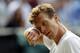 Tomas Berdych of the Czech Republic wipes his face during his men's semifinal singles match against Andy Murray of Britain during their men's semifinal singles match on day twelve of the Wimbledon Tennis Championships in London, Friday, July 8, 2016. (AP Photo/Alastair Grant)