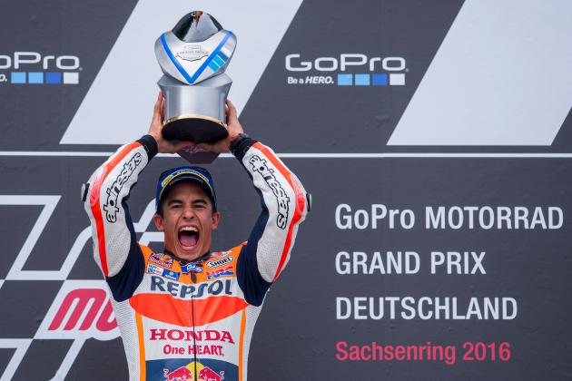 Honda rider Marc Marquez of Spain celebrates on the podium after winning the MotoGP race of the Grand Prix of Germany at the Sachsenring Circuit on July 17, 2016 in Hohenstein-Ernstthal, eastern Germany. / AFP / Robert MICHAEL        (Photo credit should read ROBERT MICHAEL/AFP/Getty Images)