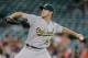 HOUSTON, TX - JULY 07: Rich Hill #18 of the Oakland Athletics pitches in the first inning against the Houston Astros at Minute Maid Park on July 7, 2016 in Houston, Texas. (Photo by Bob Levey/Getty Images)