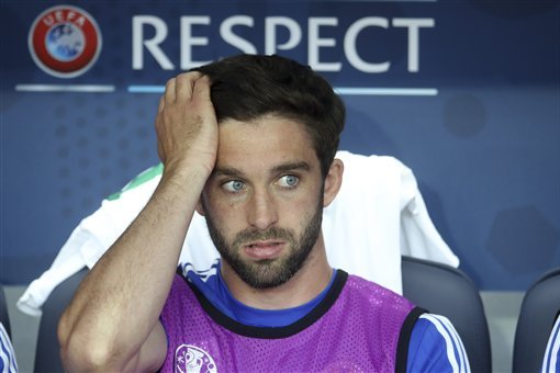 Northern Ireland's Will Grigg sits on the bench before the start of the Euro 2016 round of 16 soccer match between Wales and Northern Ireland, at the Parc des Princes stadium in Paris, Saturday, June 25, 2016. (AP Photo/Petr David Josek)