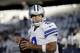 Dallas Cowboys quarterback Tony Romo (9) warms up before an NFL football game against the New York Giants, Sunday, Sept. 13, 2015, in Arlington, Texas. (AP Photo/Brandon Wade)
