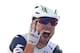 Britain's Mark Cavendish flashes four fingers for his fourth victory in this year's Tour de France as he crosses the finish line to win the fourteenth stage of the Tour de France cycling race over 208.5 kilometers (129.2 miles) with start in Montelimar and finish in Villars-les-Dombes, France, Saturday, July 16, 2016. (AP Photo/Peter Dejong)
