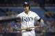 Tampa Bay Rays' Evan Longoria walks towards the dugout to get a new bat after breaking one after fouling off a pitch during the first inning of a professional baseball game against the Baltimore Orioles in St. Petersburg, Fla., Friday, July 15, 2016. (AP Photo/Phelan M. Ebenhack)