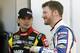 Jeff Gordon, left, and Dale Earnhardt Jr., talk outside the garage during practice for the NASCAR Daytona 500 Sprint Cup Series auto race at Daytona International Speedway, Wednesday, Feb. 20, 2013, in Daytona Beach, Fla. (AP Photo/Terry Renna)