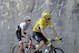 Netherlands' Bauke Mollema and Britain's Chris Froome, wearing the overall leader's yellow jersey, climb during the seventeenth stage of the Tour de France cycling race over 184.5 kilometers (114.3 miles) with start in Bern and finish in Finhaut-Emosson, Switzerland, Wednesday, July 20, 2016. (AP Photo/Christophe Ena)