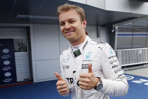 Mercedes driver Nico Rosberg, of Germany, celebrates after setting the pole position during the qualifying session for Sunday's Formula One Russian Grand Prix at the Sochi Autodrom racetrack, in Sochi, Russia, Saturday, April 30, 2016. (AP Photo/Pavel Golovkin)