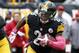 Pittsburgh Steelers running back Le'Veon Bell (26) carries the ball during an NFL football game against the Arizona Cardinals, Sunday, Oct. 18, 2015 in Pittsburgh. (AP Photo/Gene J. Puskar)