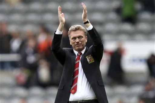 FILE - In this April 5, 2014 file photo, Manchester United manager David Moyes celebrates the team's victory over Newcastle United at the end of their English Premier League soccer match at St James' Park, Newcastle, England. Spanish club Real Sociedad hired Moyes on Monday, Nov. 10, giving the Scotsman a chance to revive his career after his failed stint at Old Trafford. It is Moyes' first coaching assignment since being fired last season after less than a year in charge at United, where he took the top job after Alex Ferguson retired. (AP Photo/Scott Heppell, File)