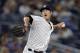 New York Yankees relief pitcher Andrew Miller (48) delivers a pitch during the eighth inning of a baseball game against the Boston Red Sox on Sunday, July 17, 2016, in New York. (AP Photo/Adam Hunger)