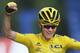 2016 Tour de France winner Chris Froome of Britain celebrates as he crosses the finish line of the twenty-first stage of the Tour de France cycling race over 113 kilometers (70.2 miles) with start in Chantilly and finish in Paris, France, Sunday, July 24, 2016. (AP Photo/Peter Dejong)