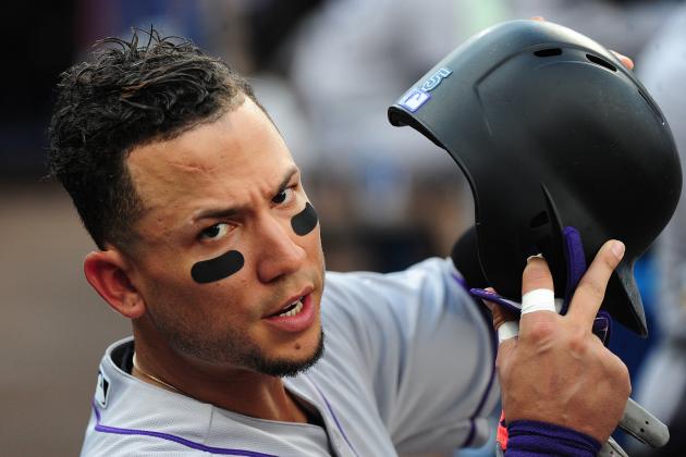 ATLANTA, GA - JULY 15: Carlos Gonzalez #5 of the Colorado Rockies gets set to hit against the Atlanta Braves at Turner Field on July 15, 2016 in Atlanta, Georgia. (Photo by Scott Cunningham/Getty Images)