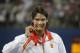 FILE - In this Aug. 17, 2008, file photo, Rafael Nadal of Spain bites his gold medal after beating Fernando Gonzalez of Chile during their gold medal singles tennis match at the Beijing 2008 Olympics in Beijing. Nadal is on the final entry list for the Rio Olympics. The 14-time major champion hasn't played since pulling out of the French Open because of an injured left wrist and needed the International Tennis Federation's Olympic Committee to approve his appeal because he hasn't played Davis Cup. (AP Photo/Elise Amendola, File)