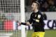 Dortmund's Marco Reus celebrates scoring the opening goal during the German Bundesliga soccer match between VfL Wolfsburg and Borussia Dortmund in Wolfsburg, Germany, Saturday, Dec. 5, 2015. (AP Photo/Michael Sohn)