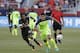 Liverpool's Dejan Lovren (6) chases the ball as AC Milan's Luiz Adriano pursues during the first half of an International Champions Cup soccer match Saturday, July 30, 2016, in Santa Clara, Calif. (AP Photo/Marcio Jose Sanchez)