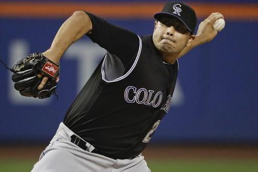 Colorado Rockies' Jorge De La Rosa delivers a pitch during the first inning of a baseball game against the New York Mets Saturday, July 30, 2016, in New York. (AP Photo/Frank Franklin II)