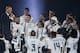 MADRID, SPAIN - MAY 29: Head coach Zinedine Zidane of Real Madrid CF jokes with his players as they celebrate with their fans at Santiago Bernabeu Stadium the day after winning the UEFA Champions League Final match against Club Atletico de Madrid on May 29, 2016 in Madrid, Spain. Real Madrid CF is the only European football team with 11 European Cups (Photo by Gonzalo Arroyo Moreno/Getty Images)