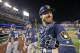 Milwaukee Brewers catcher Jonathan Lucroy smiles as he leaves the field after celebrating with his teammates, after a baseball game against the Washington Nationals at Nationals Park, Tuesday, July 5, 2016, in Washington. The Brewers won 5-2. (AP Photo/Alex Brandon)
