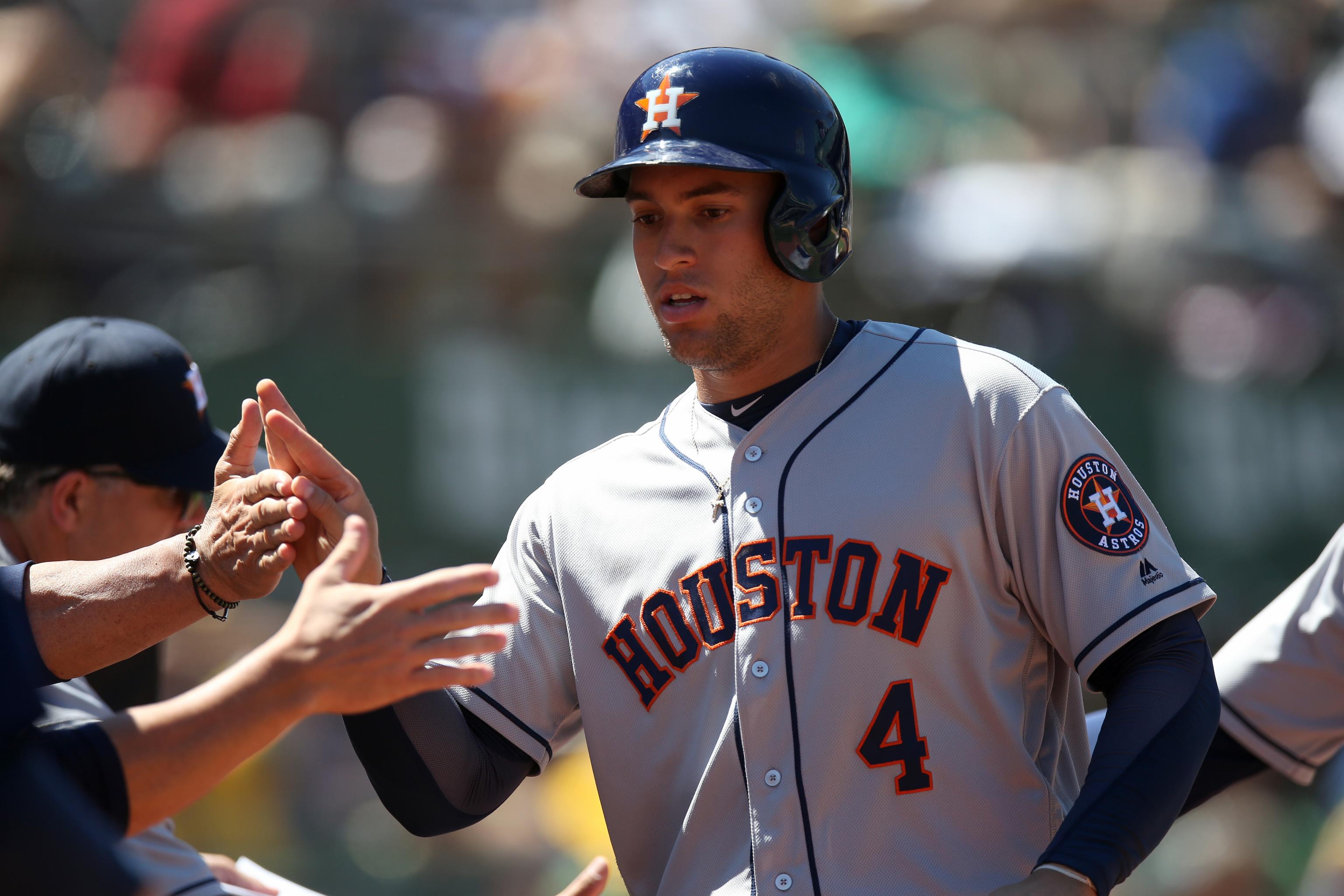 Astros' Evan Gattis suffers minor injury against Oakland