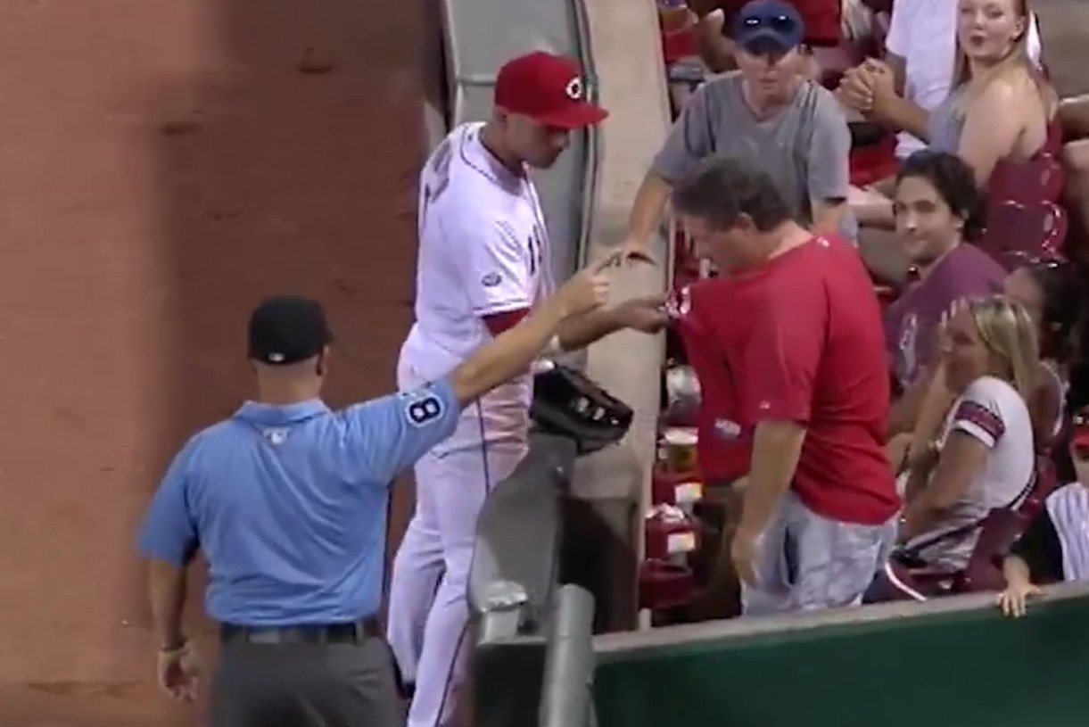 Joey Votto Grabs Fan's Shirt After Getting Tangled Trying to Catch
