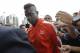 Italian soccer forward Mario Balotelli arrives at AC Milan headquarters, in Milan, Italy, Tuesday, Aug. 25, 2015. AC Milan's vice president Adriano Galliani said the club is in talks with Liverpool about bringing striker Mario Balotelli back to Serie A. (AP Photo/Luca Bruno)
