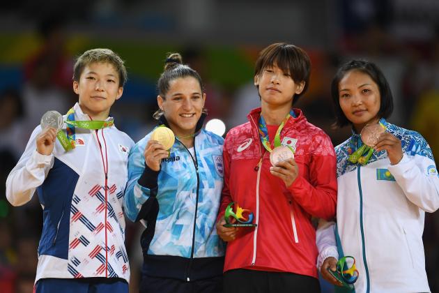 RIO DE JANEIRO, BRAZIL - AUGUST 06: Silver medalist Bokyeong Jeong of Korea, gold medalist Paula Pareto of Argentina, bronze medalist Ami Kondo of Japan and bronze medalist Otgontsetseg Galbadrakh of Kazakhstan stand on the podium after the Women's -48 kg Judo competition on Day 1 of the Rio 2016 Olympic Games at Carioca Arena 2 on August 6, 2016 in Rio de Janeiro, Brazil. (Photo by Laurence Griffiths/Getty Images)