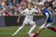 OSLO, NORWAY - August 9: Martin Odegaard of Real Madrid, Christian Grindheim of Vaalerenga during Pre-season Friendly match between Vaalerenga and Real Madrid at Ullevaal Stadion on August 9, 2015 in Oslo, Norway. (Photo by Trond Tandberg/Getty Images)