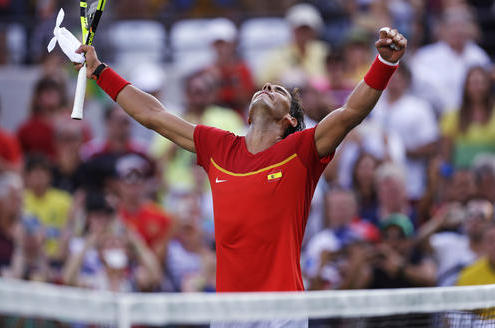 Rafael Nadal, of Spain, celebrates after defeating Andreas Seppi, of Italy, at the 2016 Summer Olympics in Rio de Janeiro, Brazil, Tuesday, Aug. 9, 2016. (AP Photo/Charles Krupa)
