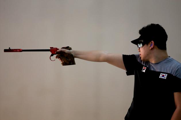 RIO DE JANEIRO, BRAZIL - APRIL 19: World recod holder and Olympic gold medalist Jongoh Jin of South Korea competes in the men 50m Pistol competition during the International Shooting Tournament - Aquece Rio Test Event for the Rio 2016 Olympics at the Olympic Shooting Center in Deodoro Olympic Park on April 19, 2016 in Rio de Janeiro, Brazil. (Photo by Matthew Stockman/Getty Images)