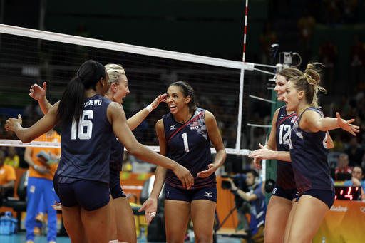 Team United States celebrates during a women's preliminary volleyball match against the Netherlands at the 2016 Summer Olympics in Rio de Janeiro, Brazil, Monday, Aug. 8, 2016. (AP Photo/Matt Rourke)