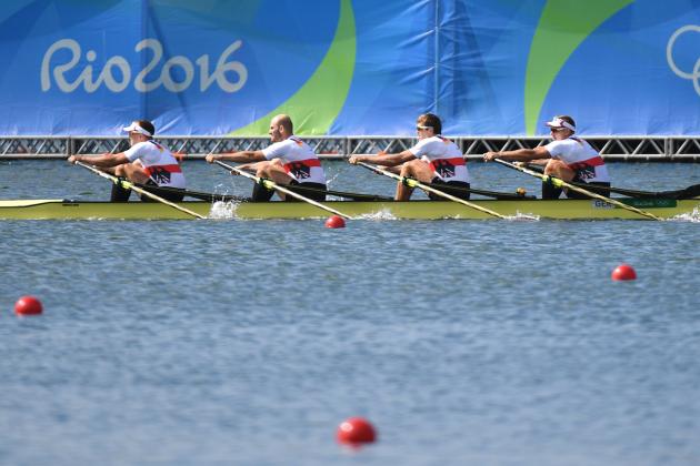 (From L) Germany's Hans Gruhne, Germany's Karl Schulze, Germany's Lauritz Schoof and Germany's Philipp Wende row during the Men's Quadruple Sculls final rowing competition at the Lagoa stadium during the Rio 2016 Olympic Games in Rio de Janeiro on August 11, 2016. / AFP / Damien MEYER        (Photo credit should read DAMIEN MEYER/AFP/Getty Images)