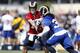 Los Angeles Rams quarterback Case Keenum, left, hands off the ball to running back Todd Gurley, right, during the NFL football team's training camp, Saturday, July 30, 2016, in Irvine, Calif. (AP Photo/Ryan Kang)