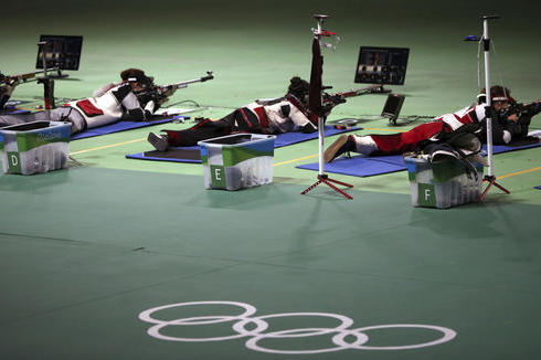 Athletes compete during the women's 50 meter rifle 3 positions finals at Olympic Shooting Center at the 2016 Summer Olympics in Rio de Janeiro, Brazil, Thursday, Aug. 11, 2016. (AP Photo/Eugene Hoshiko)