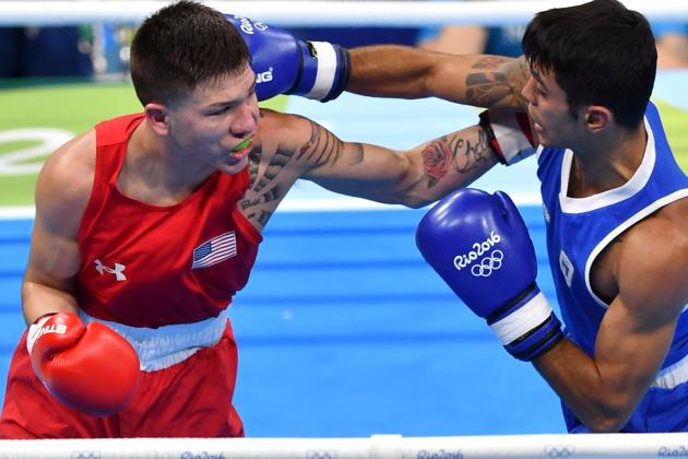 USA's Nico Miguel Hernandez (L) fights Italy's Manuel Cappai during the Men's Light Fly (46-49kg) match at the Rio 2016 Olympic Games at the Riocentro - Pavilion 6 in Rio de Janeiro on August 6, 2016.   / AFP / Yuri CORTEZ        (Photo credit should read YURI CORTEZ/AFP/Getty Images)