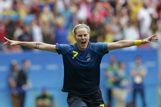 Sweden's Lisa Dahlkvist celebrates after scoring in the penalty kicks during a quarter-final match of the women's Olympic football tournament between the United States and Sweden in Brasilia Friday Aug. 12, 2016. Sweden beat the United Sates on penalty shootout.(AP Photo/Eraldo Peres)
