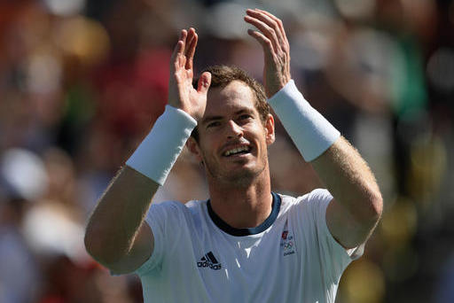 Great Britain's Andy Murray celebrates defeating Japan's Kei Nishikori in the semifinals of the men's singles tennis competition at the 2016 Summer Olympics in Rio de Janeiro, Brazil, Saturday, Aug. 13, 2016. (AP Photo/Vadim Ghirda)
