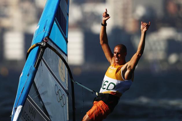 RIO DE JANEIRO, BRAZIL - AUGUST 14: Dorian van Rijsselberghe of the Netherlands celebrates winning the overall Men's RS:X class on Day 9 of the Rio 2016 Olympic Games at the Marina da Gloria on August 14, 2016 in Rio de Janeiro, Brazil. (Photo by Mark Kolbe/Getty Images)