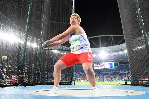 Poland's Anita Wlodarczyk competes in the Women's Hammer Throw Qualifying Round during the athletics event at the Rio 2016 Olympic Games at the Olympic Stadium in Rio de Janeiro on August 12, 2016.   / AFP / FRANCK FIFE        (Photo credit should read FRANCK FIFE/AFP/Getty Images)