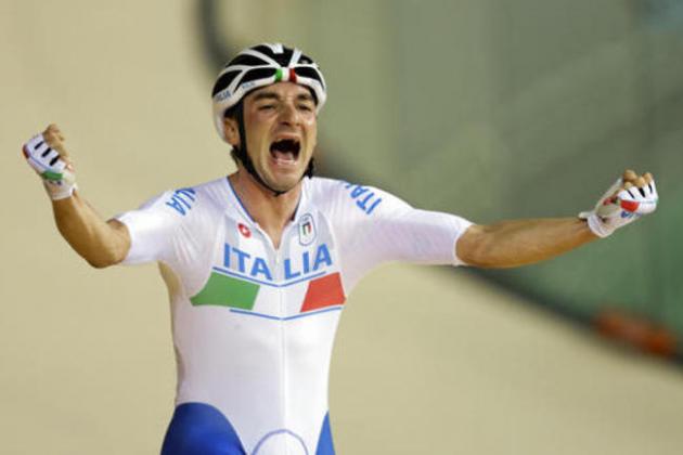 Elia Viviani of Italy celebrates after winning gold in the men's omnium cycling event at the Rio Olympic Velodrome during the 2016 Summer Olympics in Rio de Janeiro, Brazil, Monday, Aug. 15, 2016. (AP Photo/Victor R. Caivano)