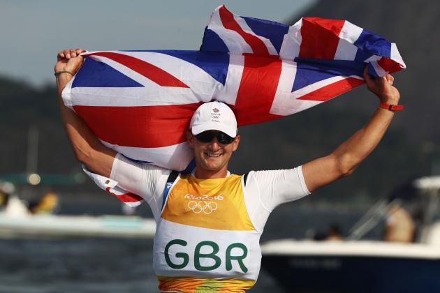 RIO DE JANEIRO, BRAZIL - AUGUST 16: Giles Scott of Great Britain celebrates winning the gold medal in the Finn class on Day 11 of the Rio 2016 Olympic Games at the Marina da Gloria on August 16, 2016 in Rio de Janeiro, Brazil. (Photo by Clive Mason/Getty Images)