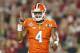 GLENDALE, AZ - JANUARY 11: Deshaun Watson #4 of the Clemson Tigers celebrates after throwing an 11 yard touchdown pass to Hunter Renfrow #13 in the first quarter against the Alabama Crimson Tide during the 2016 College Football Playoff National Championship Game at University of Phoenix Stadium on January 11, 2016 in Glendale, Arizona. (Photo by Christian Petersen/Getty Images)