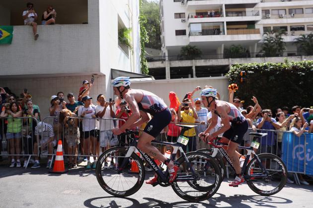 RIO DE JANEIRO, BRAZIL - AUGUST 18: Alistair Brownlee and Jonathan Brownlee of Great Britain compete during the Men's Triathlon at Fort Copacabana on Day 13 of the 2016 Rio Olympic Games on August 18, 2016 in Rio de Janeiro, Brazil. (Photo by Bryn Lennon/Getty Images)