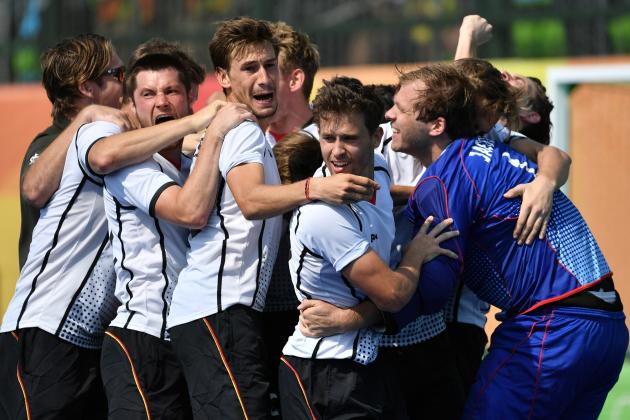 Germany's players celebrate after winning the men's Bronze medal field hockey Netherlands vs Germany match of the Rio 2016 Olympics Games at the Olympic Hockey Centre in Rio de Janeiro on August 17, 2016. / AFP / Pascal GUYOT        (Photo credit should read PASCAL GUYOT/AFP/Getty Images)