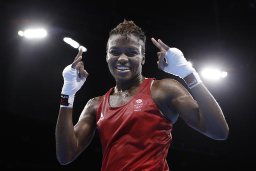Britain's Nicola Adams poses after winning a women's flyweight 51-kg semifinals boxing match against China's Ren Cancan at the 2016 Summer Olympics in Rio de Janeiro, Brazil, Thursday, Aug. 18, 2016. (AP Photo/Frank Franklin II)