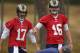 Los Angeles Rams quarterbacks Case Keenum, left, and Jared Goff talk during NFL football practice, Wednesday, June 1, 2016, in Oxnard, Calif. (AP Photo/Mark J. Terrill)