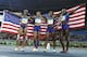The U.S. celebrates its victory in the 4 x 100 meter relay.